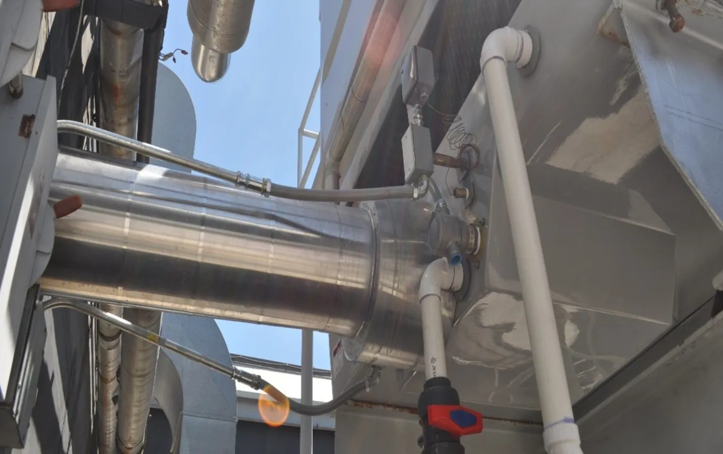 Backflow prevention assembly on a cooling tower system