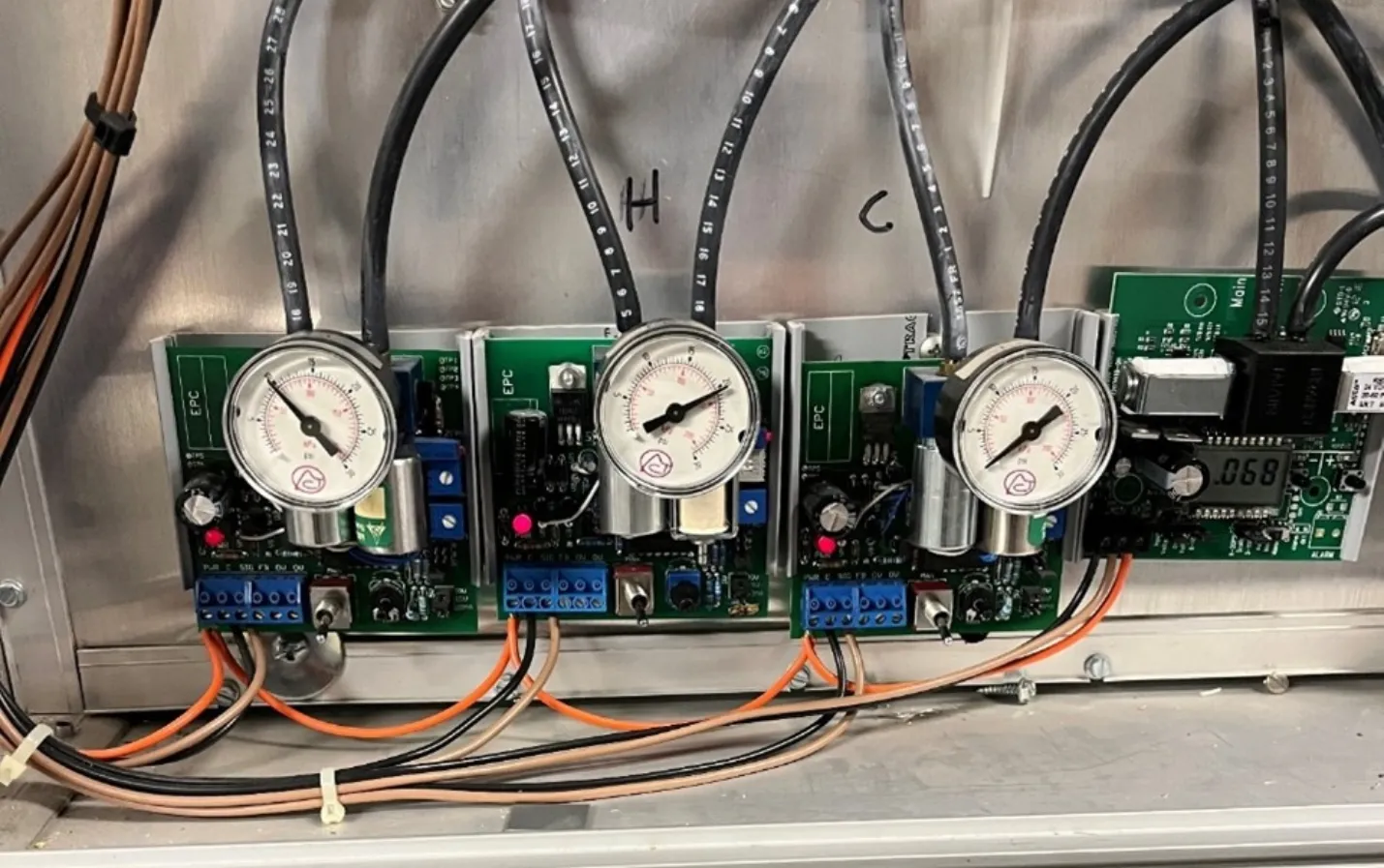 Electric pneumatic transducers mounted in a control panel
